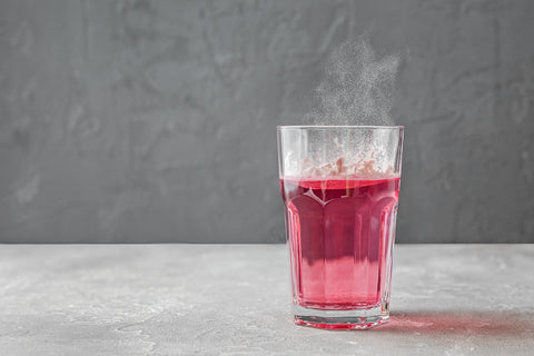 Ein Glas mit VitaMoment Daily Flavour