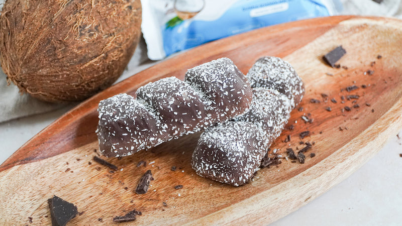 Daily Protein Riegel Creamy dunkle Schoko mit Kokoscreme: Knuspriger Proteinriegel aus dunkler Schokolade mit Kokoscreme
