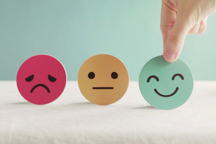 Fem-Komplex Erfahrungen: Drei Emojis stellen unterschiedliche Stimmungslagen dar