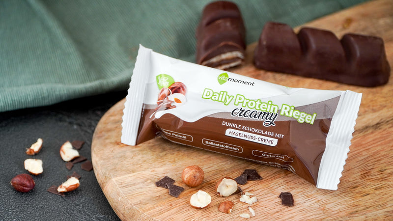 Daily Protein Riegel Creamy Vegan - Dunkle Schoko Haselnuss, 12er Box - VitaMoment Produkt